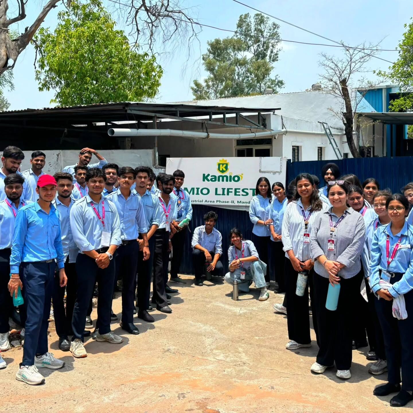 A college group on an industrial visit, outside the Kamio unit.