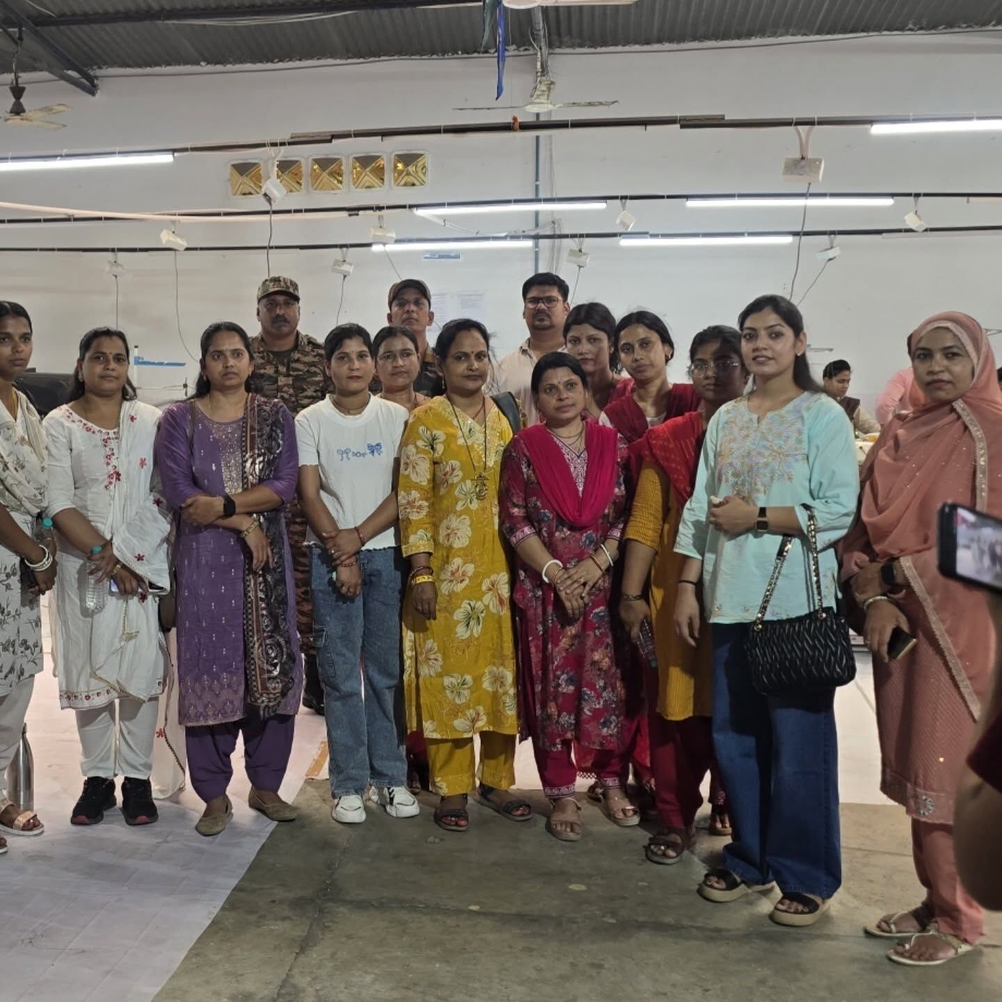 A group photo on the stitching floor.